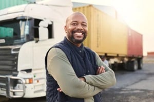 container and happy truck driver moving industry cargo and freight at a shipping supply chain or warehouse