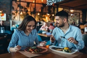 couple enjoying food in the restaurant