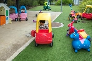 kid playing in family center