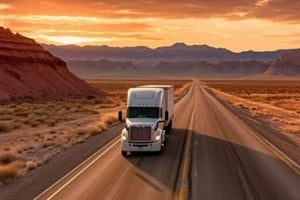 majestic scene capturing a transport semi-truck effortlessly crossing the expansive terrain of the southwest United States
