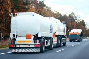 petrol truck on highway hauling fossil oil refinery products