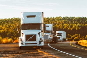 Three Trucks Parked Roadside