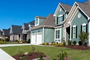 Row of homes in a suburban community covered by insurance