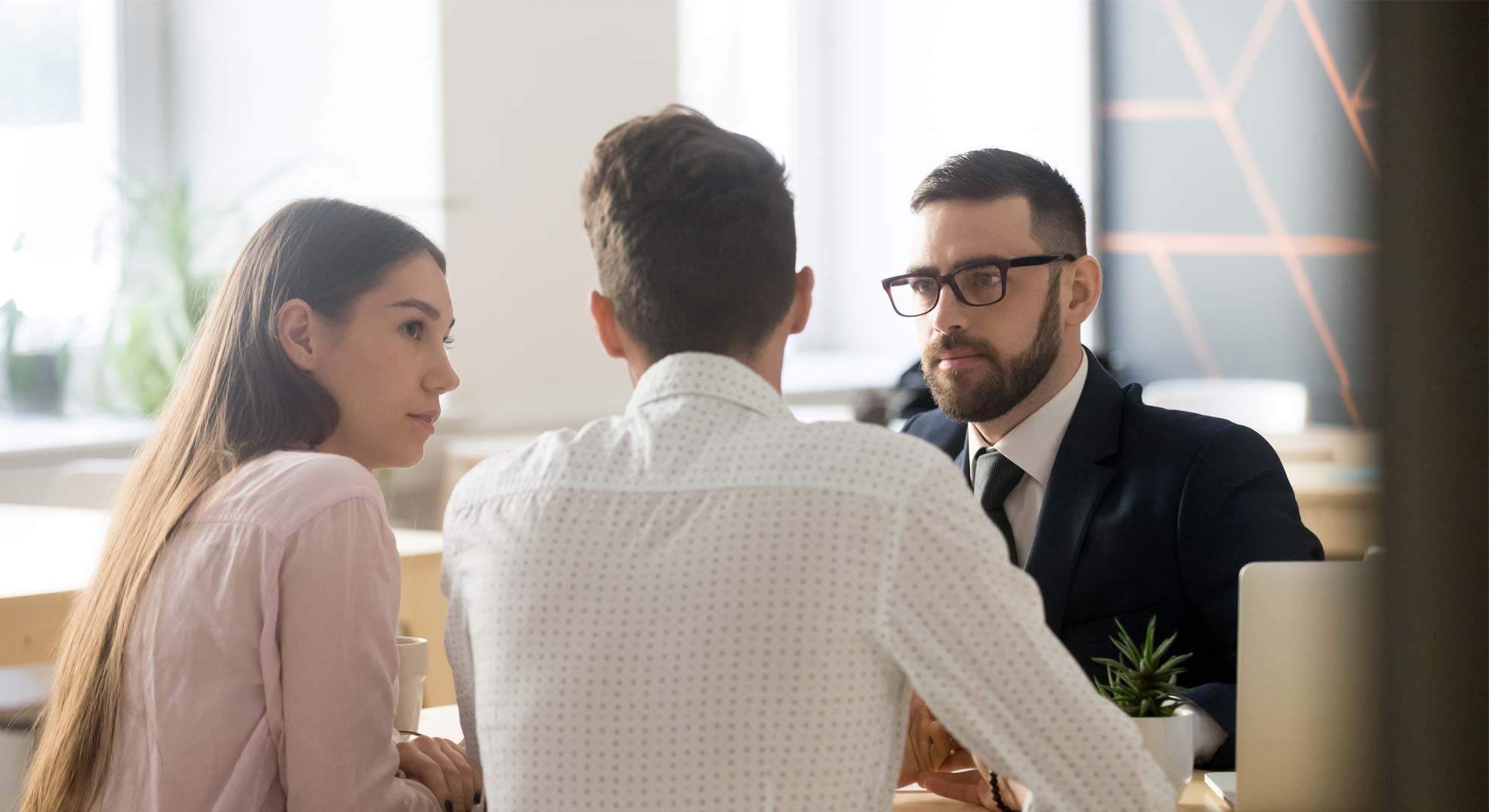 Insurance Agent talking to clients